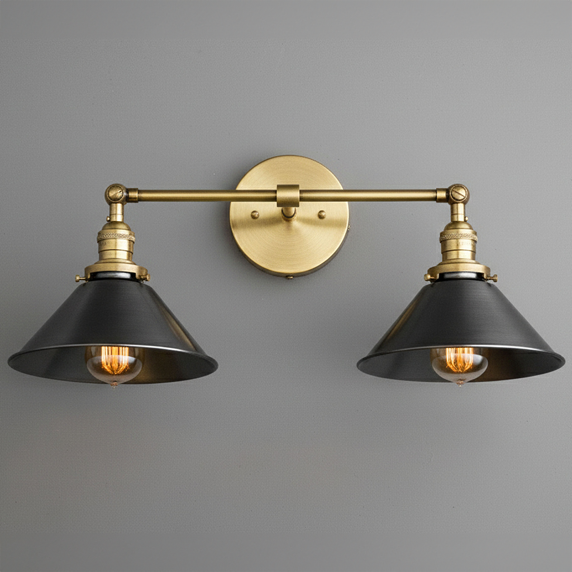 Two-bulb vanity light with black metal shades and antique brass mounting plate and arm. - VANITY LIGHT MODEL NO. 0799
