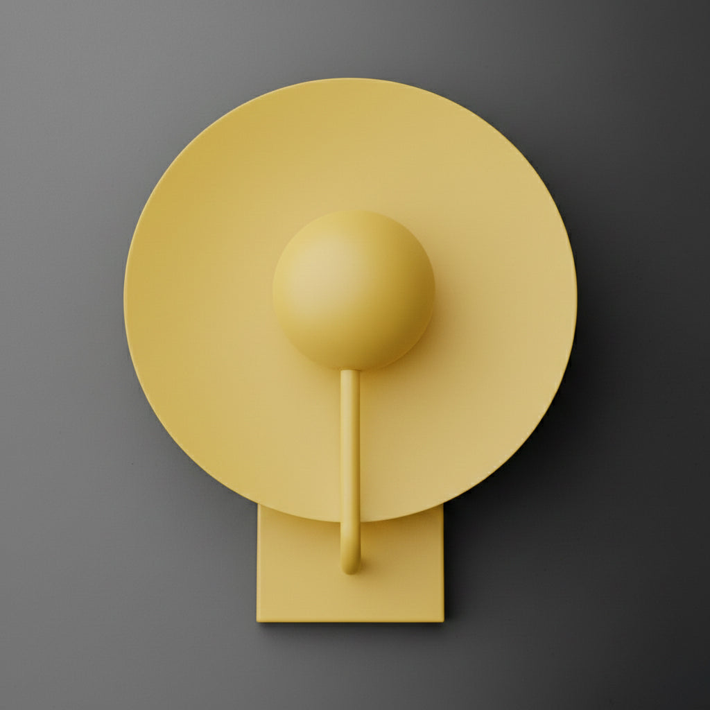 Single-light sconce in Yellow with a large round disc shade behind a globe, held on a slim curved stem from a rectangular wall plate. - SCONCE MODEL NO. 9342