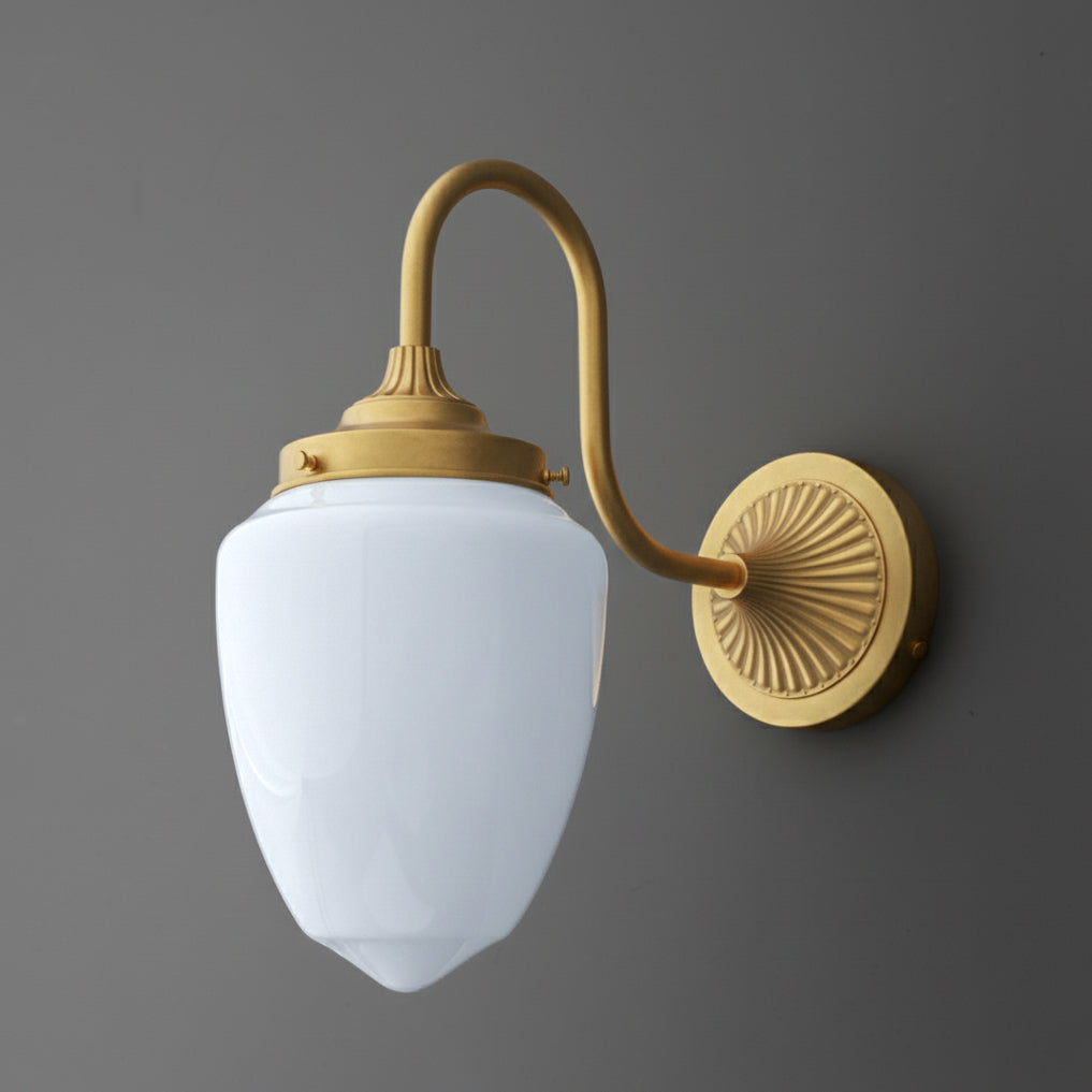 Matte gold metal wall sconce with curved arm and white frosted glass shade. - SCONCE MODEL NO. 1094