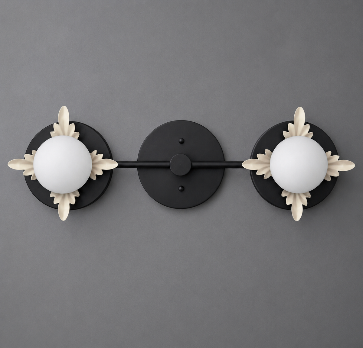 Two-light vanity light in Black with Cream leaf accents around opal glass globes on round backplates joined by a straight bar. - VANITY LIGHT MODEL NO. 1118