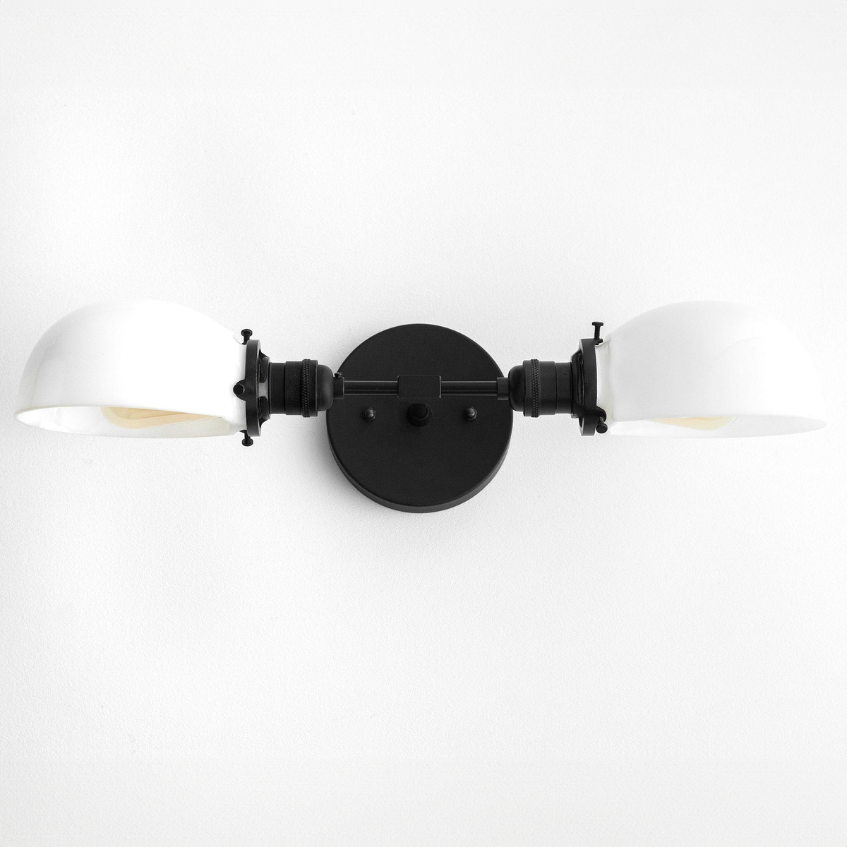 Mid-century modern black vanity light with two white dome-shaped shades and circular mounting plate. - VANITY LIGHT MODEL NO. 1734