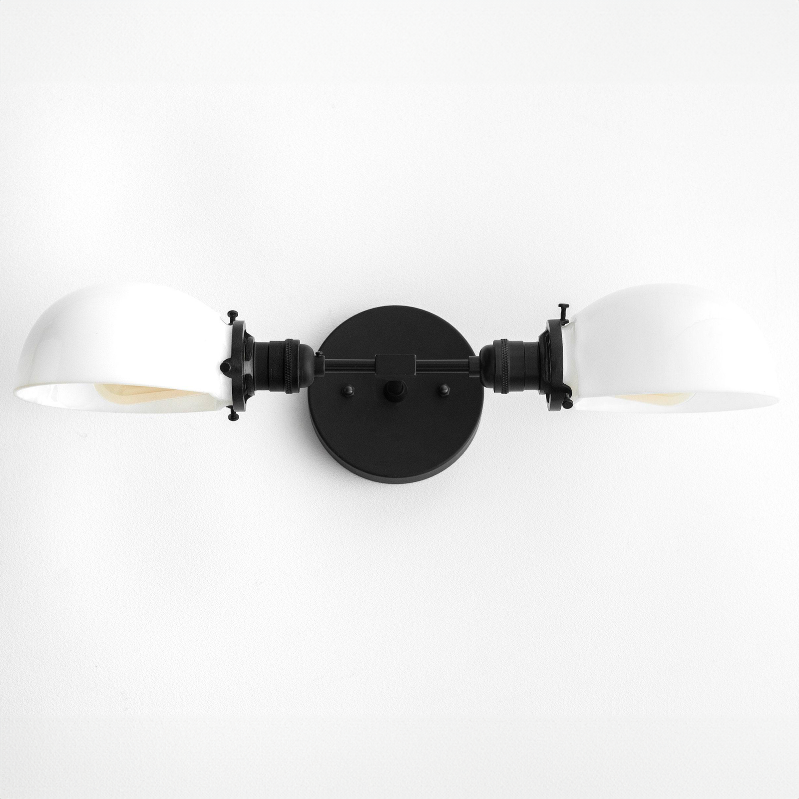 Mid-century modern black vanity light with two white dome-shaped shades and circular mounting plate. - VANITY LIGHT MODEL NO. 1734