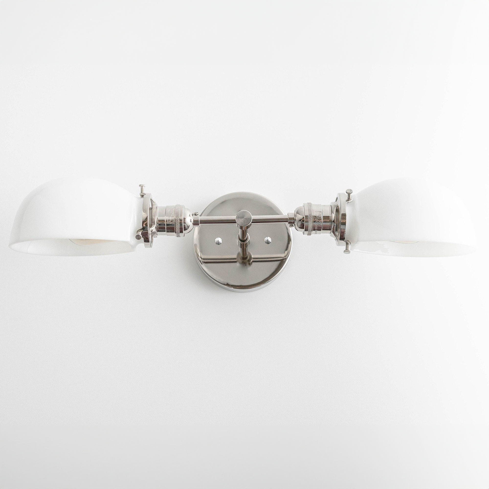 Mid-century modern 2-bulb vanity light with polished nickel finish and white shades. - VANITY LIGHT MODEL NO. 1734