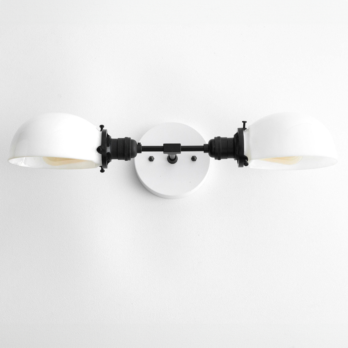 Mid-century modern vanity light with two white rounded shades and black metal fixture. - VANITY LIGHT MODEL NO. 1734