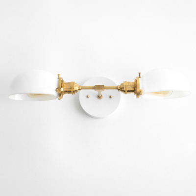 Mid-century modern 2-bulb vanity light with white glass shades and raw brass finish. - VANITY LIGHT MODEL NO. 1734