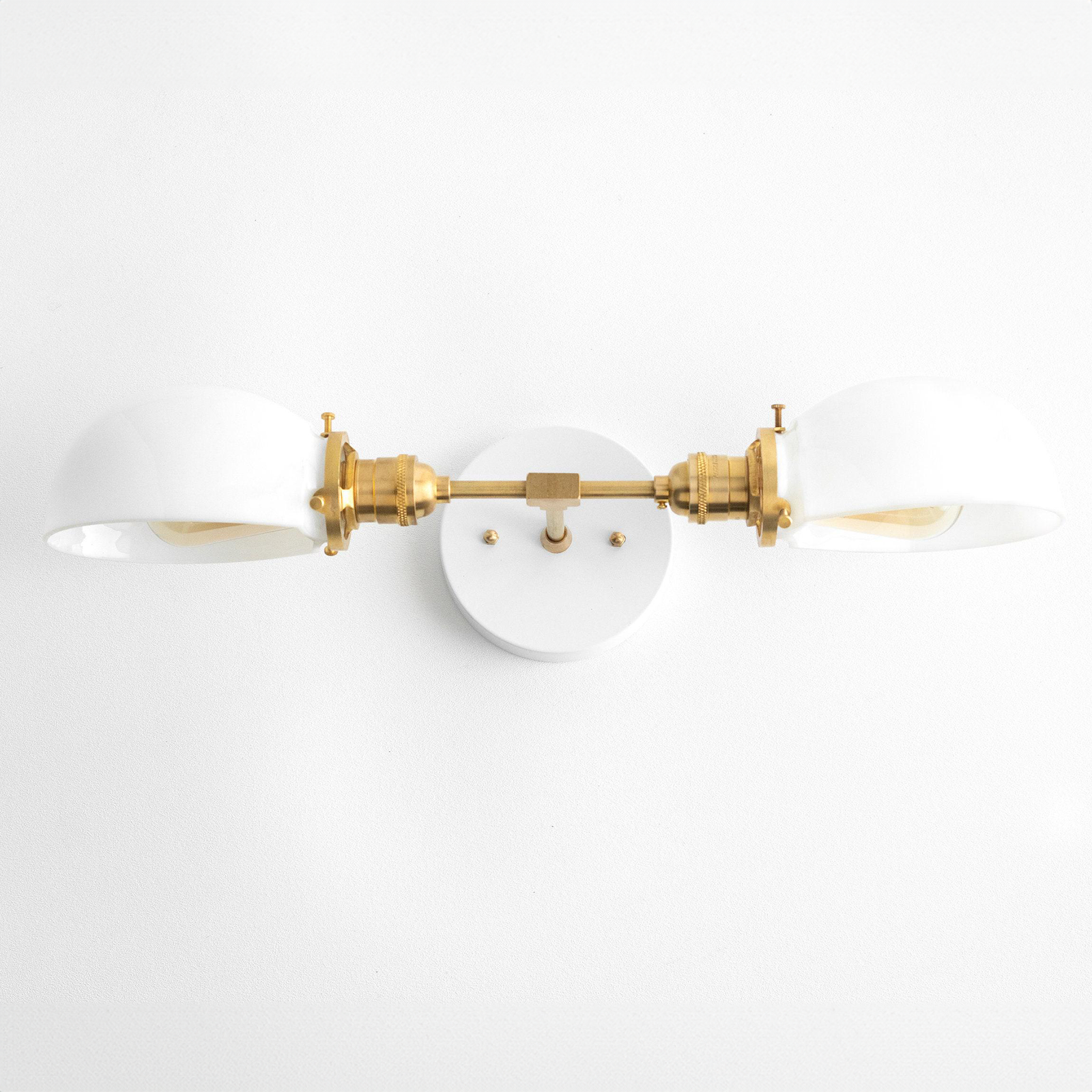 Mid-century modern 2-bulb vanity light with white shades and antique brass finish. - VANITY LIGHT MODEL NO. 1734