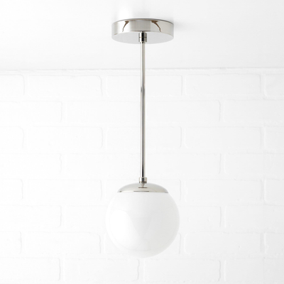 Mid-century modern pendant light with polished nickel finish and white globe shade. - PENDANT MODEL NO. 7056