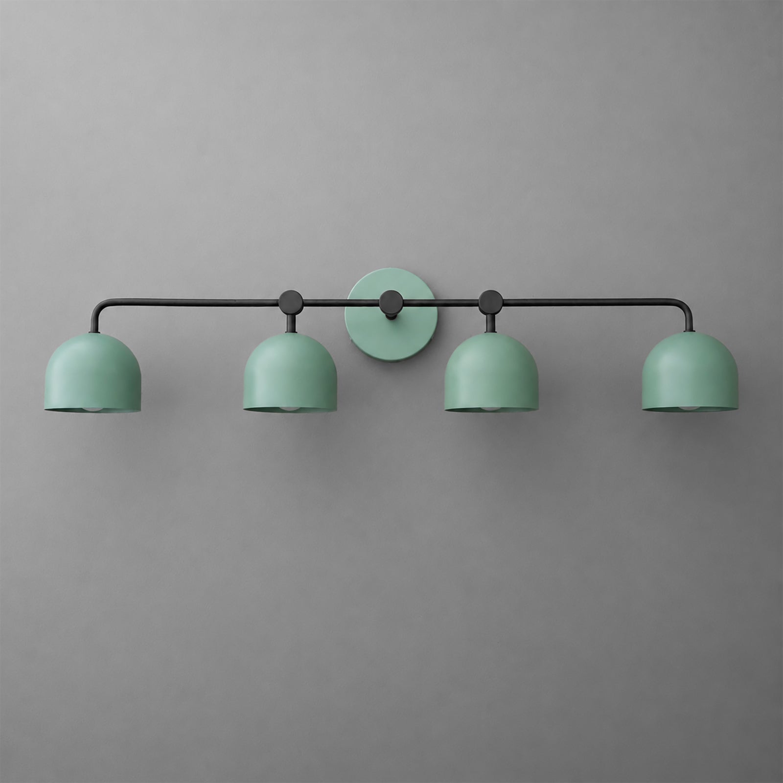 Four-light vanity light in Black with Green dome shades and a matching Green wall plate. - VANITY LIGHT MODEL NO. 1124