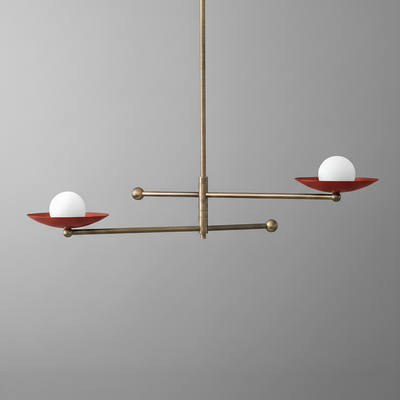 Mid-century modern chandelier with antique brass finish, two horizontal arms holding red disc shades and white globe bulbs. - CHANDELIER MODEL NO. 2933