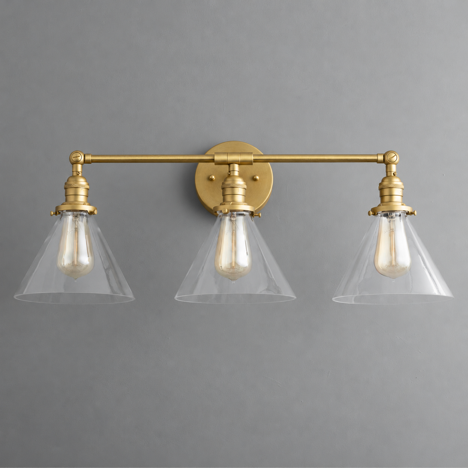VANITY LIGHT MODEL NO. 4498 in Raw Brass with clear shade