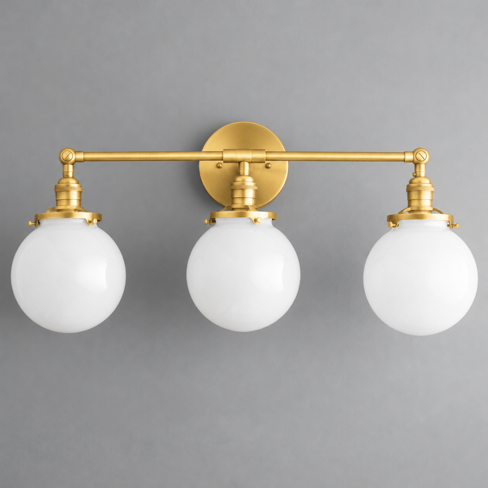 VANITY LIGHT MODEL NO. 8241 in Raw Brass with opal glass globe