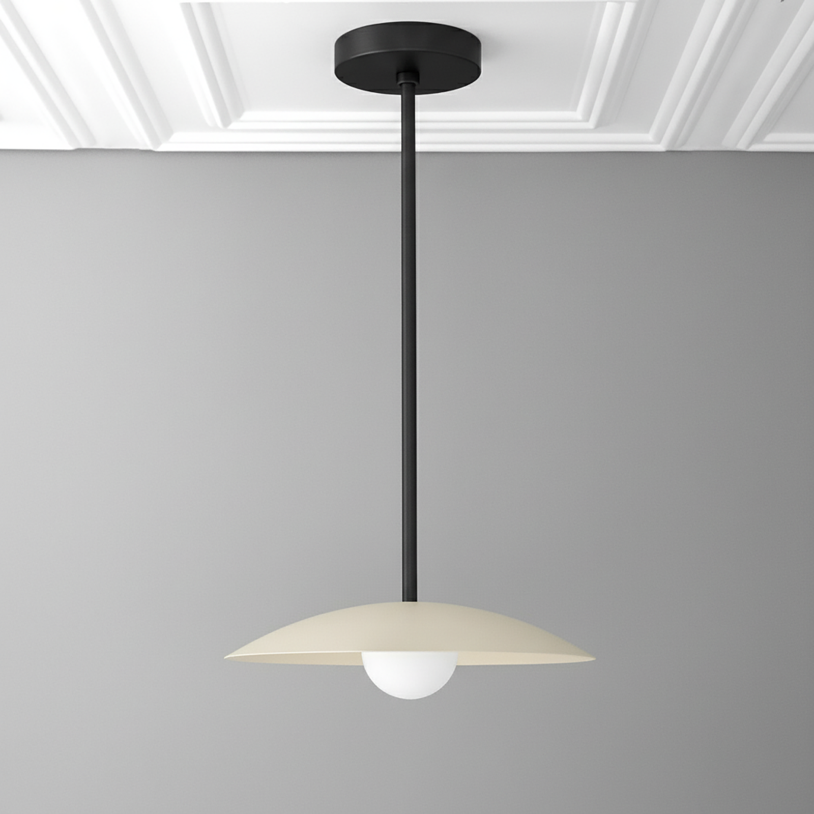 Mid-century modern pendant light with matte black rod and cream disc shade over white globe bulb. - PENDANT MODEL NO. 4085