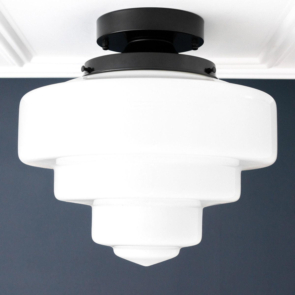 Art Deco flush mount ceiling light with tiered white glass globe and black metal base. - CEILING LIGHT MODEL NO. 7458