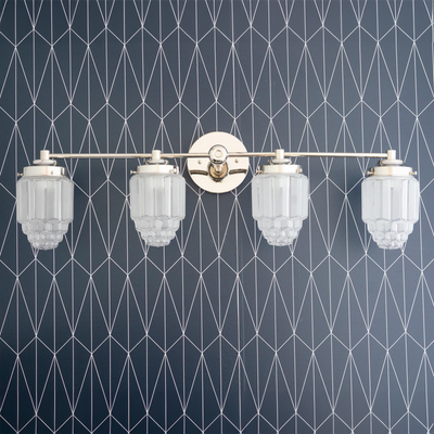 Polished nickel four-bulb vanity light with stepped glass globe shades and round wall mount. - VANITY LIGHT MODEL NO. 1082