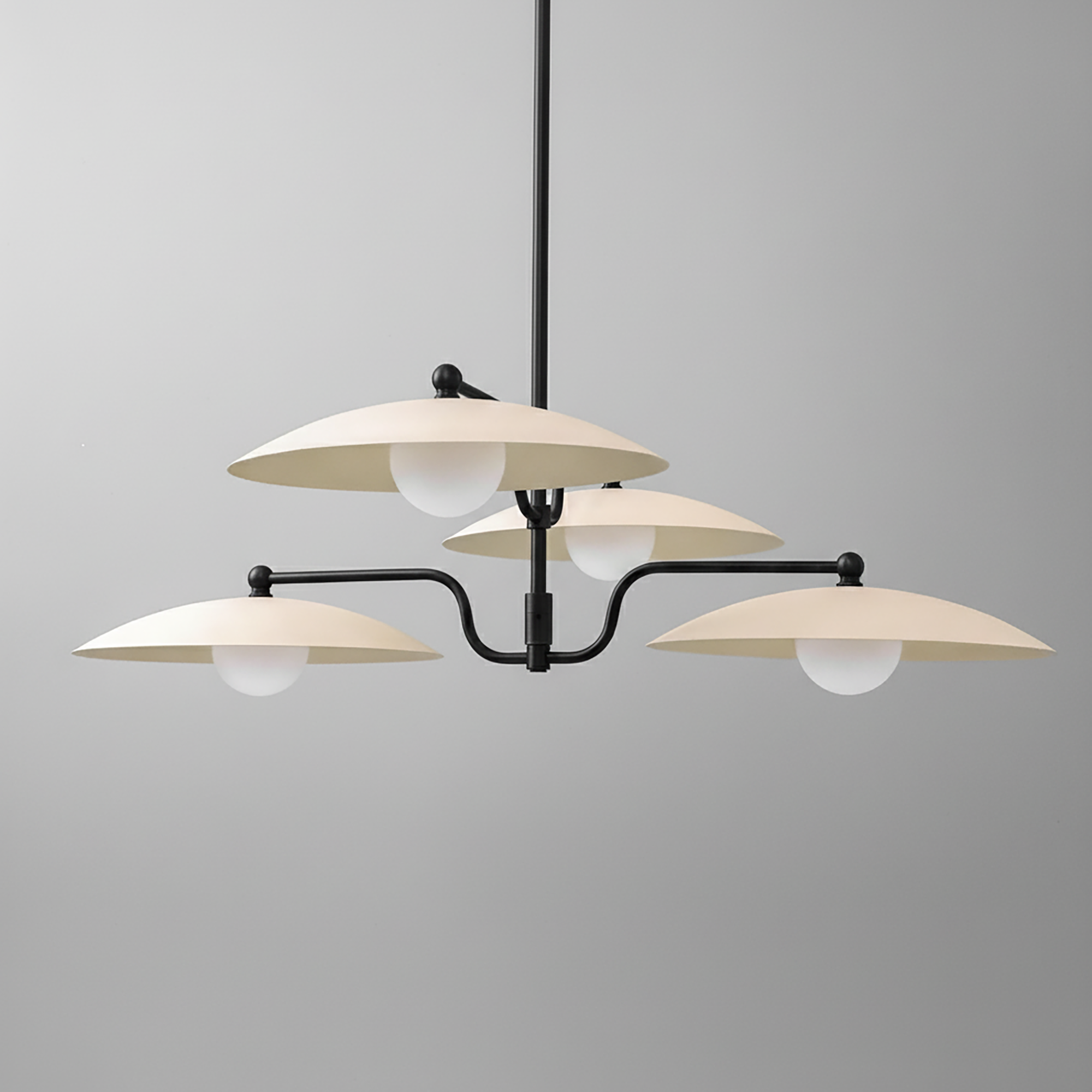 Mid-century modern chandelier with four cream-colored dome shades and matte black arms. - CHANDELIER MODEL NO. 1192