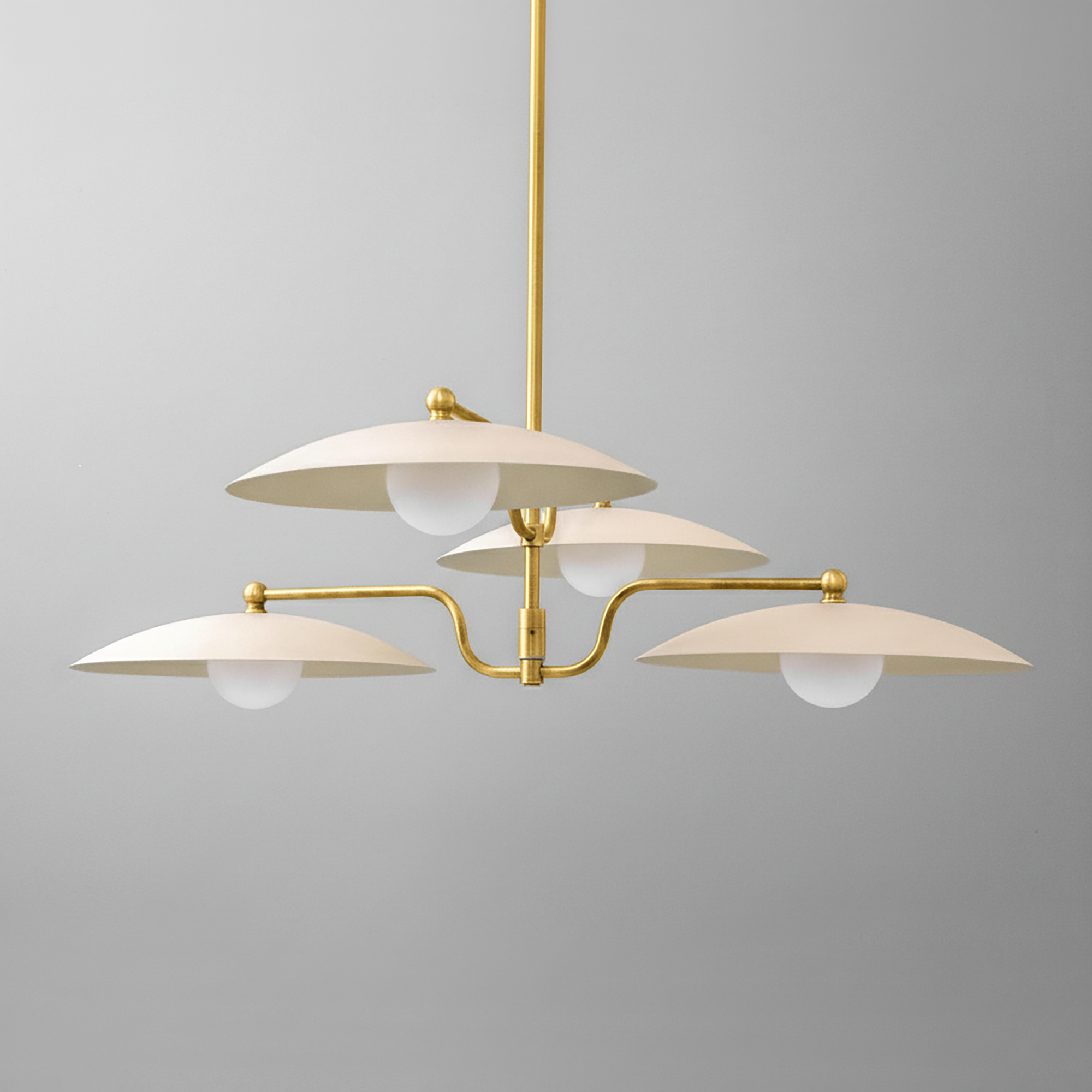 Mid-century modern chandelier with three white globe lights and curved antique brass arms. - CHANDELIER MODEL NO. 1192