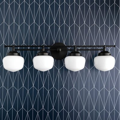 4-bulb black vanity light with rounded white globe shades mounted on geometric navy blue wall. - VANITY LIGHT MODEL NO. 9054