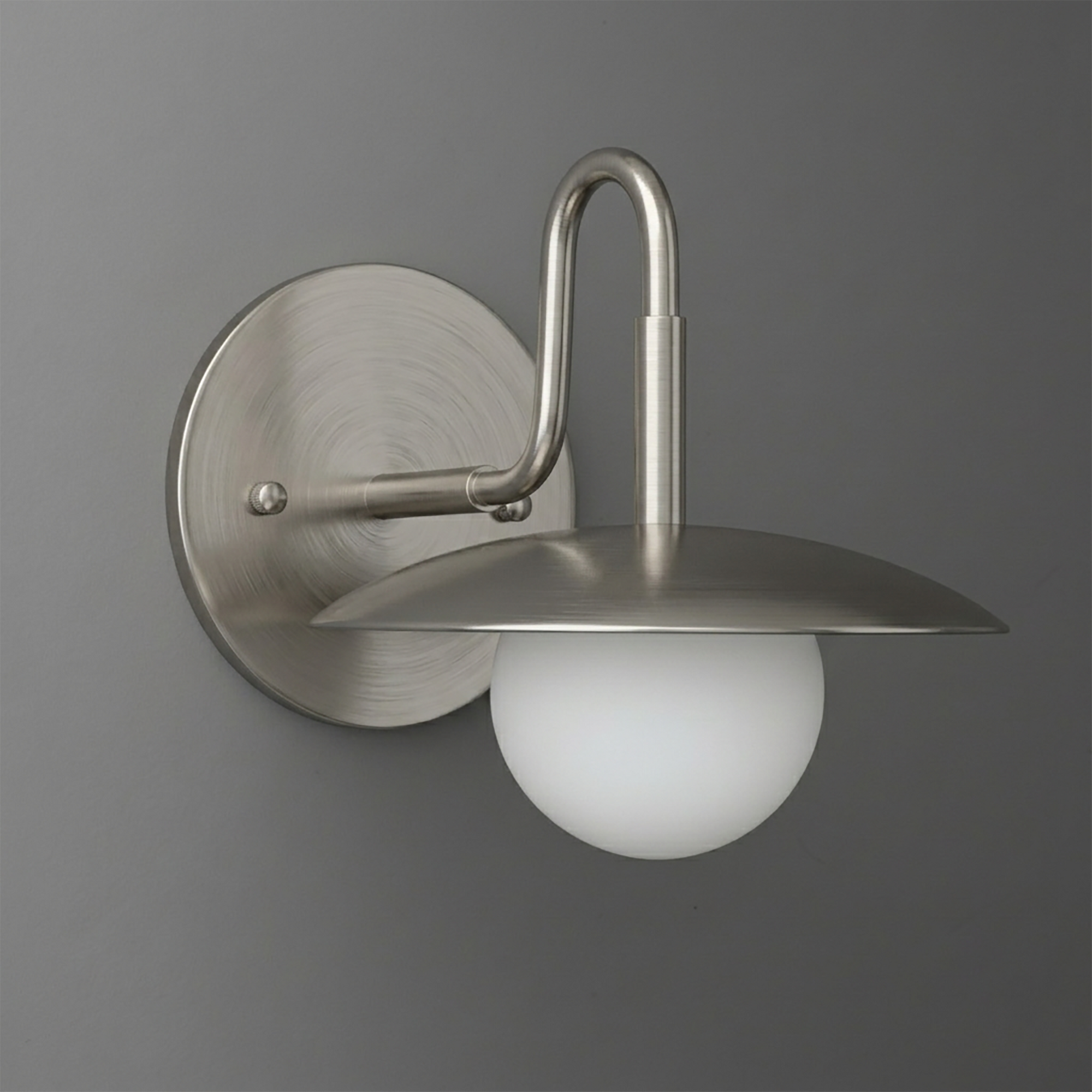 Brushed nickel 1-bulb wall sconce with curved arm and white frosted glass globe shade. - SCONCE MODEL NO. 1078
