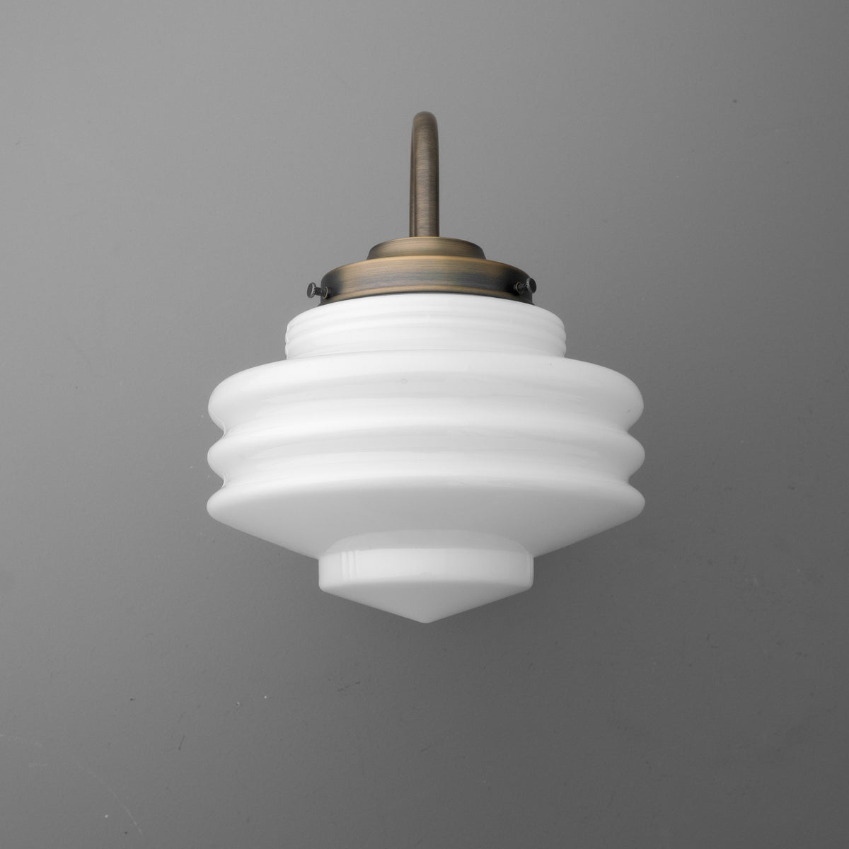 White layered glass sconce with bronze metal fixture and a concentric stepped design. - SCONCE MODEL NO. 1096