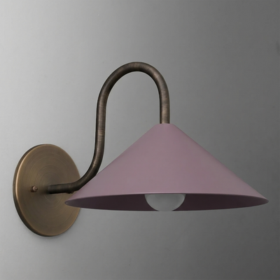 Wall-mounted sconce with a brass base and curved arm holding a wide, matte lavender metal shade with exposed bulb. - SCONCE MODEL NO. 1015