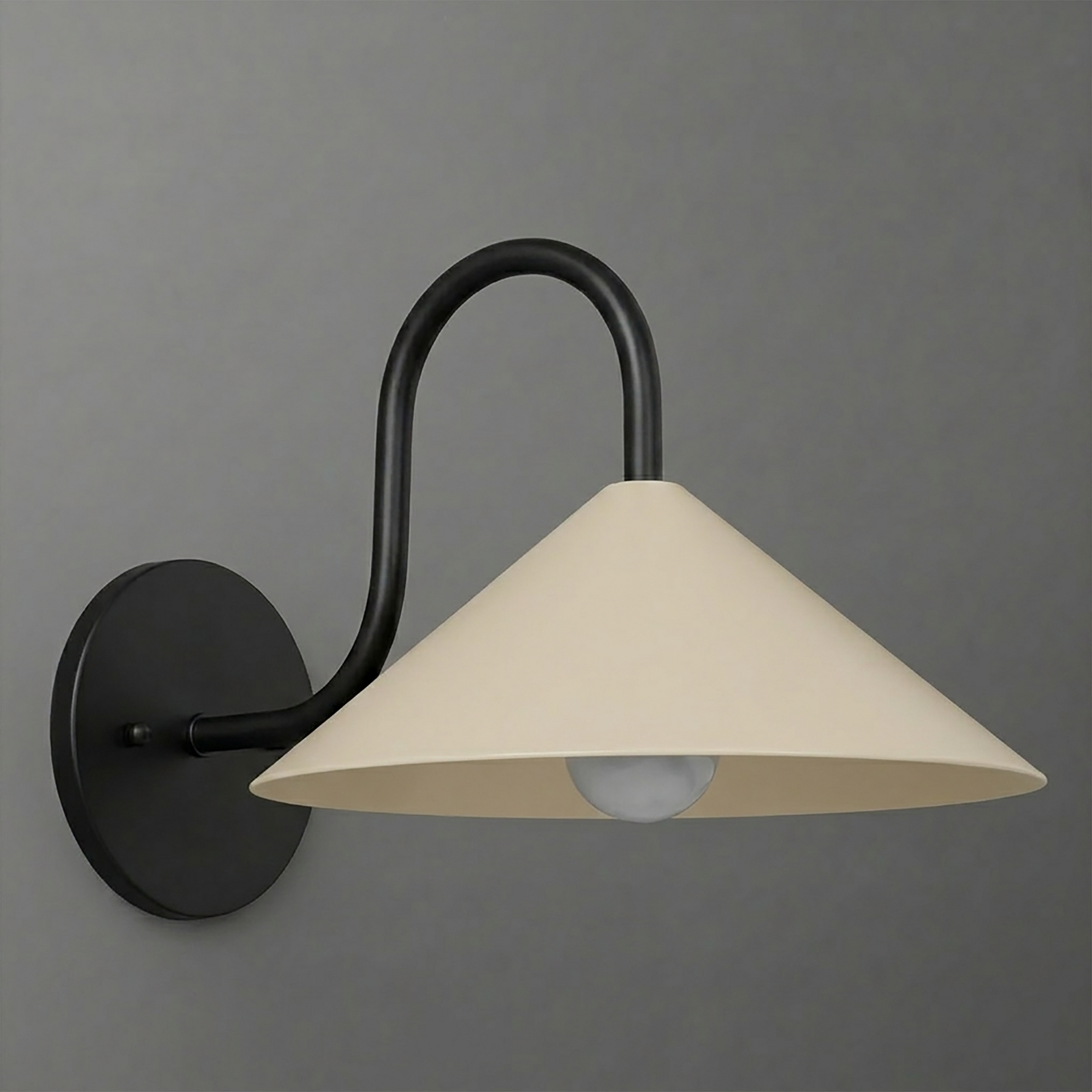Black metal wall sconce with curved arm and beige conical lampshade covering one bulb. - SCONCE MODEL NO. 1015