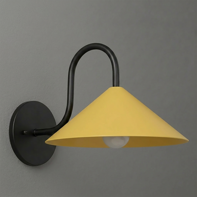 Black metal wall sconce with curved arm and wide yellow conical shade illuminating a single bulb. - SCONCE MODEL NO. 1015