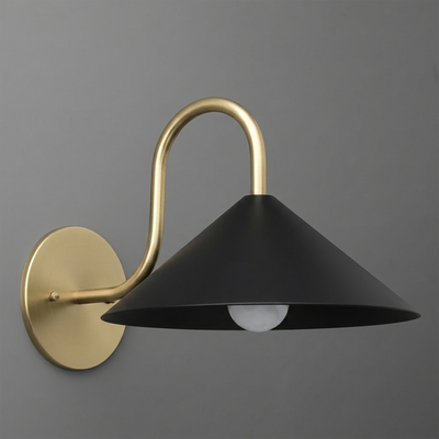 Wall sconce with matte black conical shade and curved brushed brass arm and round wall plate. - SCONCE MODEL NO. 1015