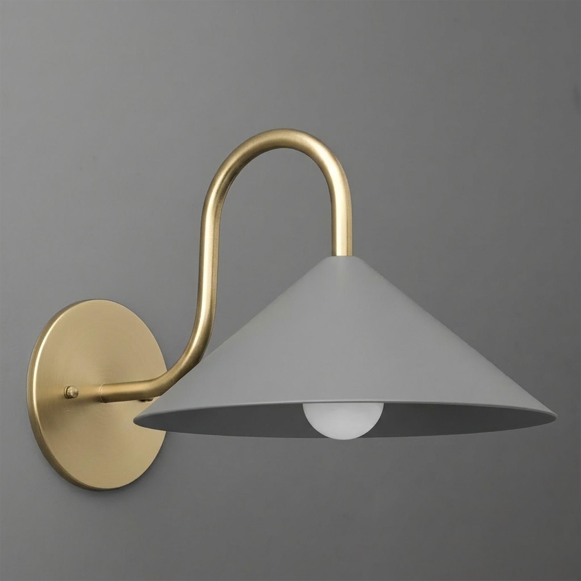Wall sconce with matte gray conical metal shade and brushed brass curved arm and round base. - SCONCE MODEL NO. 1015