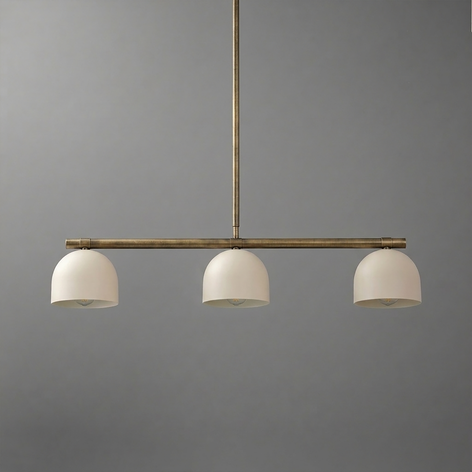 Three-bulb chandelier with matte white dome shades and a slender bronze metal frame suspension. - CHANDELIER MODEL NO. 8477