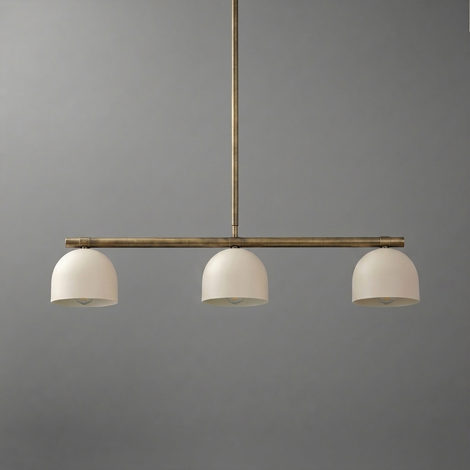 Three-bulb chandelier with matte white dome shades and a slender bronze metal frame suspension. - CHANDELIER MODEL NO. 8477