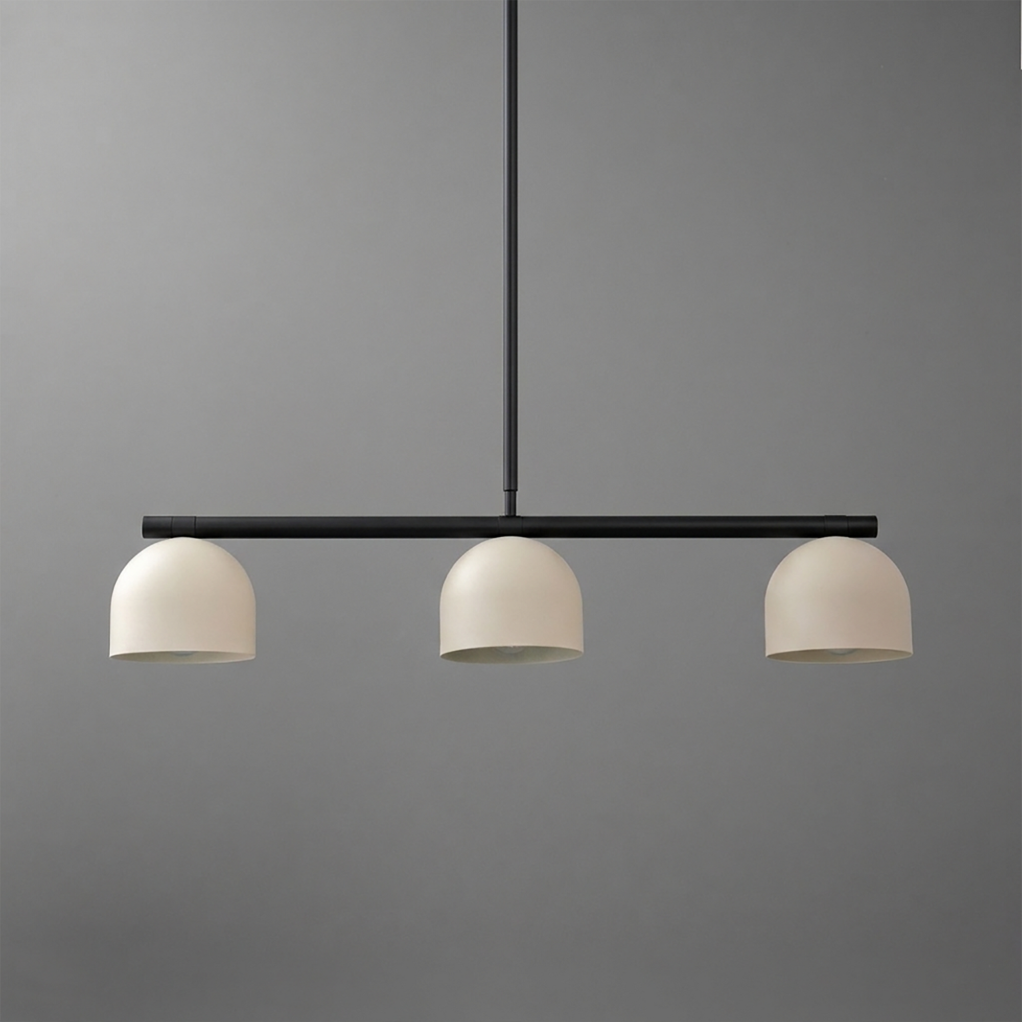 Black metal chandelier with three matte white dome-shaped shades in a linear design. - CHANDELIER MODEL NO. 8477