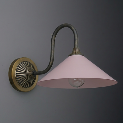 Wall sconce with brass base, curved black metal arm, and wide pastel pink conical shade. - SCONCE MODEL NO. 1031