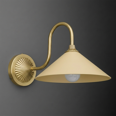 Wall sconce with a curved brass arm and circular backplate, featuring a wide beige conical metal shade and exposed bulb. - SCONCE MODEL NO. 1031