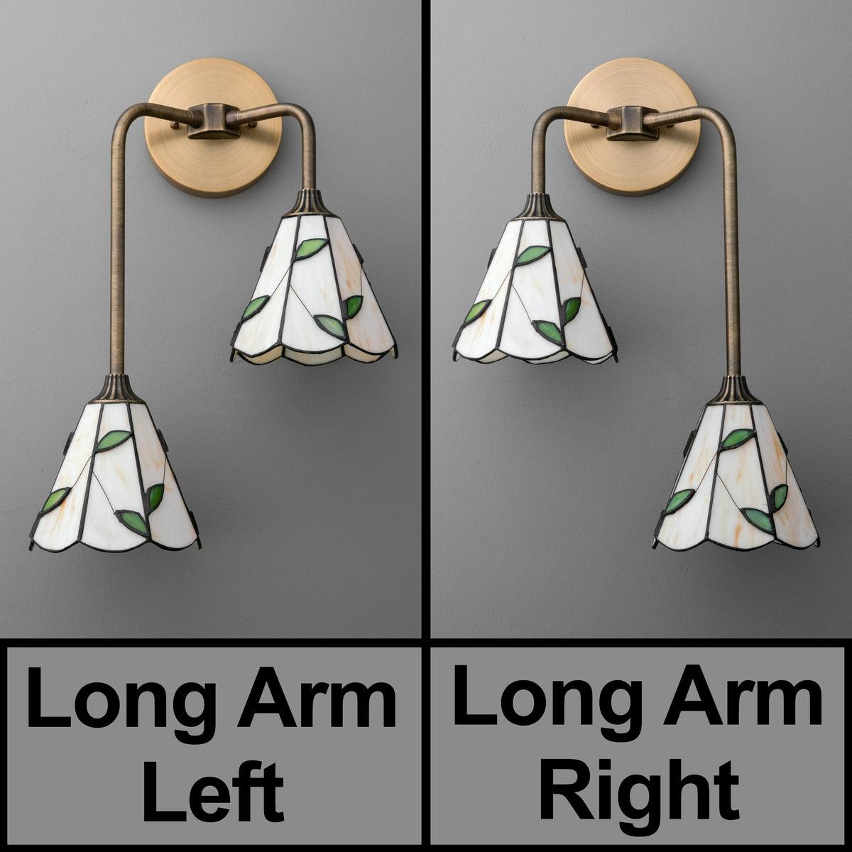 Pair of bronze metal sconces with long curved arms and white stained glass shades featuring green leaf accents. - SCONCE MODEL NO. 8593