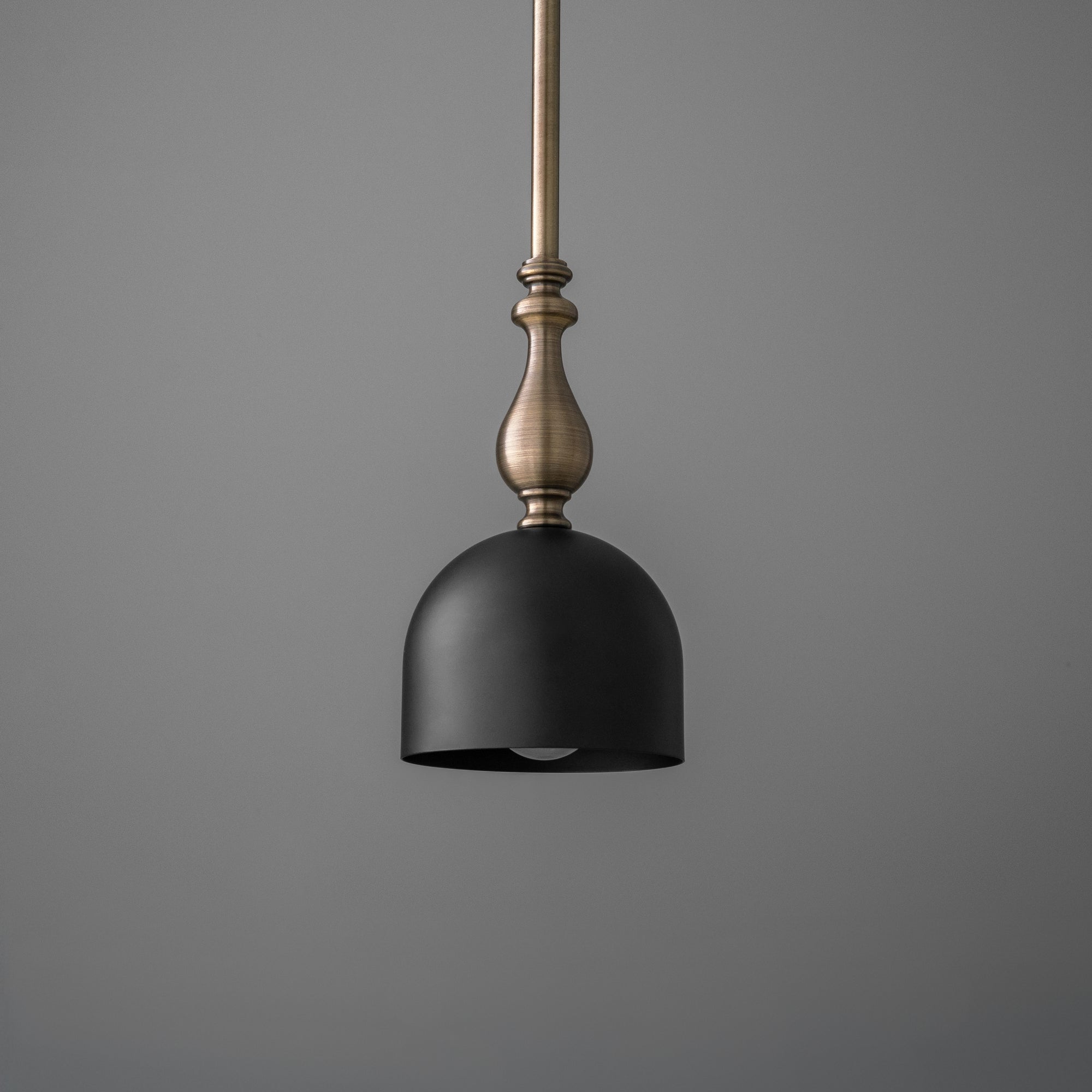 Antique brass pendant light with matte black deep ball shade and slender stem. - PENDANT MODEL N0. 6780