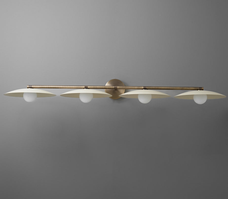 Brushed brass vanity light fixture with four evenly spaced white glass globe bulbs and a slim horizontal bar design. - VANITY LIGHT MODEL NO. 1152