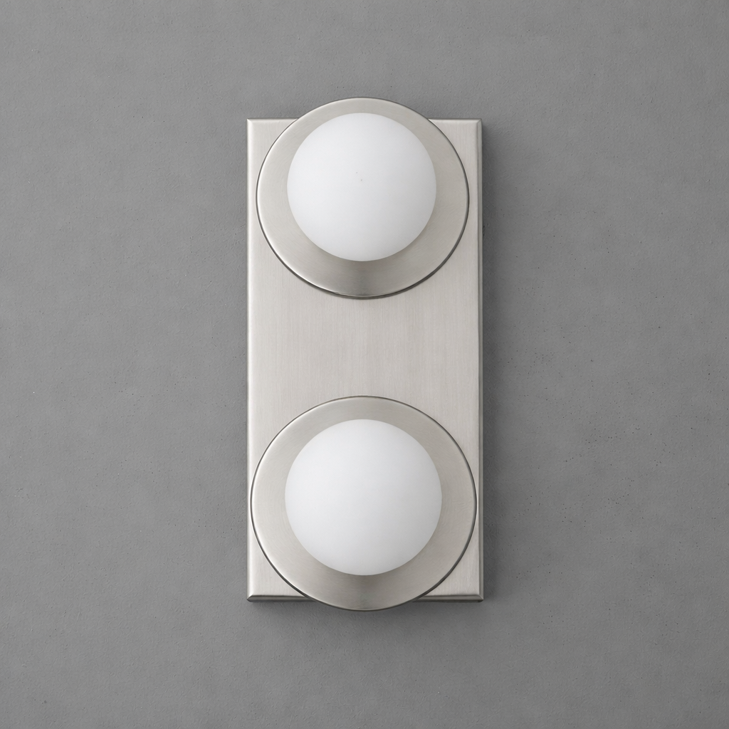 Two-light sconce in Brushed Nickel with round plates and opal glass globes on a tall rectangular backplate. - SCONCE MODEL NO. 8828