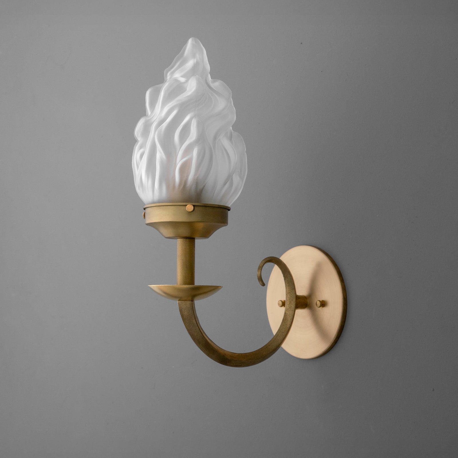 Wall sconce with bronze curved arm and frosted glass flame-shaped shade. - SCONCE MODEL NO. 1057