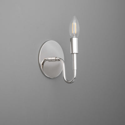 Chrome metal wall sconce with oval base and single curved arm holding a flame-shaped bulb. - SCONCE MODEL NO. 1100