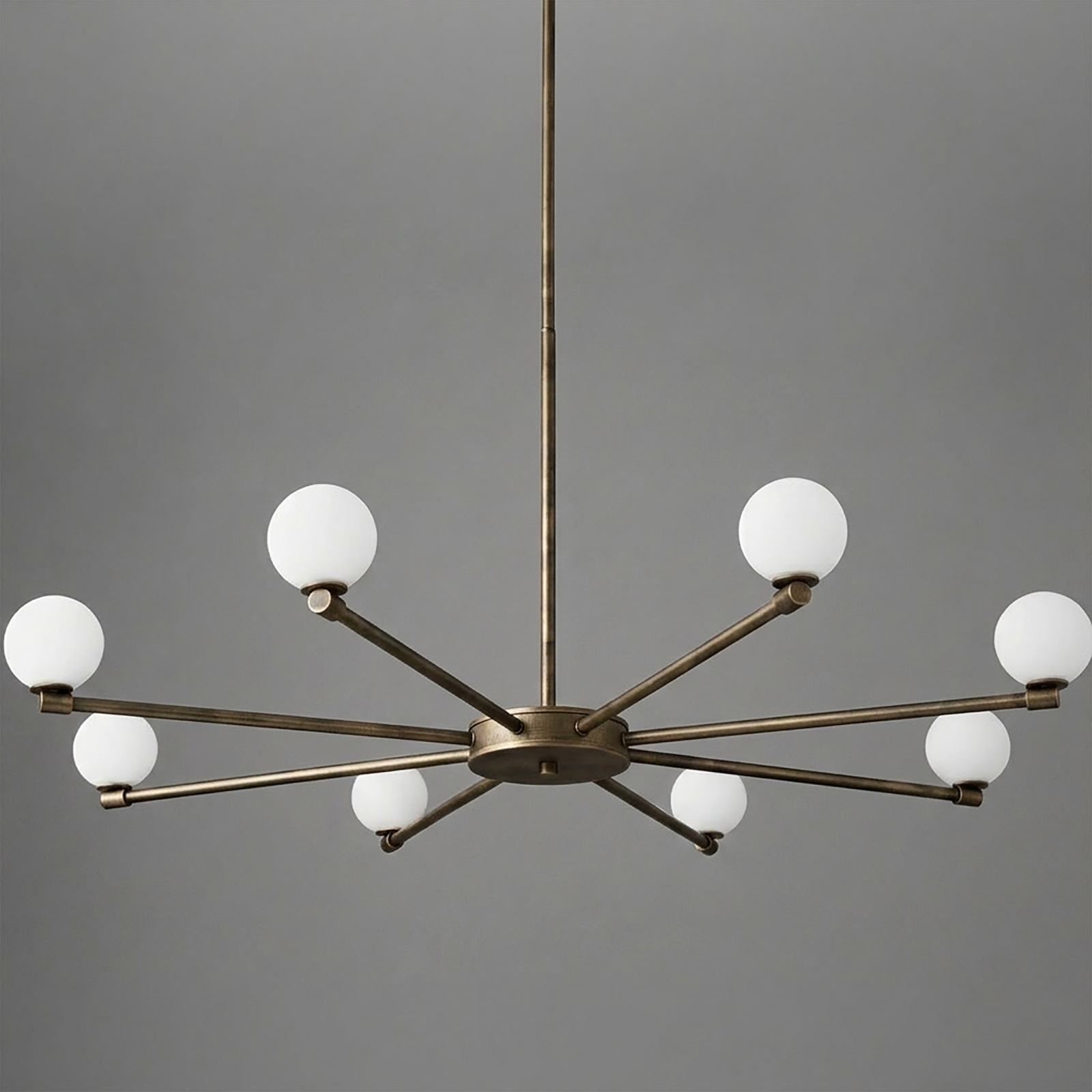 Brushed brass chandelier with 10 white globe bulbs arranged in a symmetrical starburst design. - CHANDELIER MODEL NO. 3192