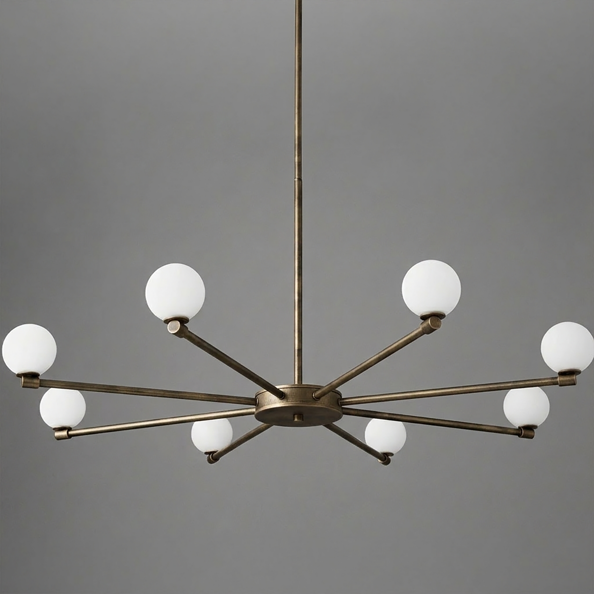 Brushed brass chandelier with 10 white globe bulbs arranged in a symmetrical starburst design. - CHANDELIER MODEL NO. 3192