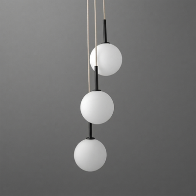 Three-globe chandelier with frosted white glass globes and black metal accents hanging vertically against dark gray. - CHANDELIER MODEL NO. 4701