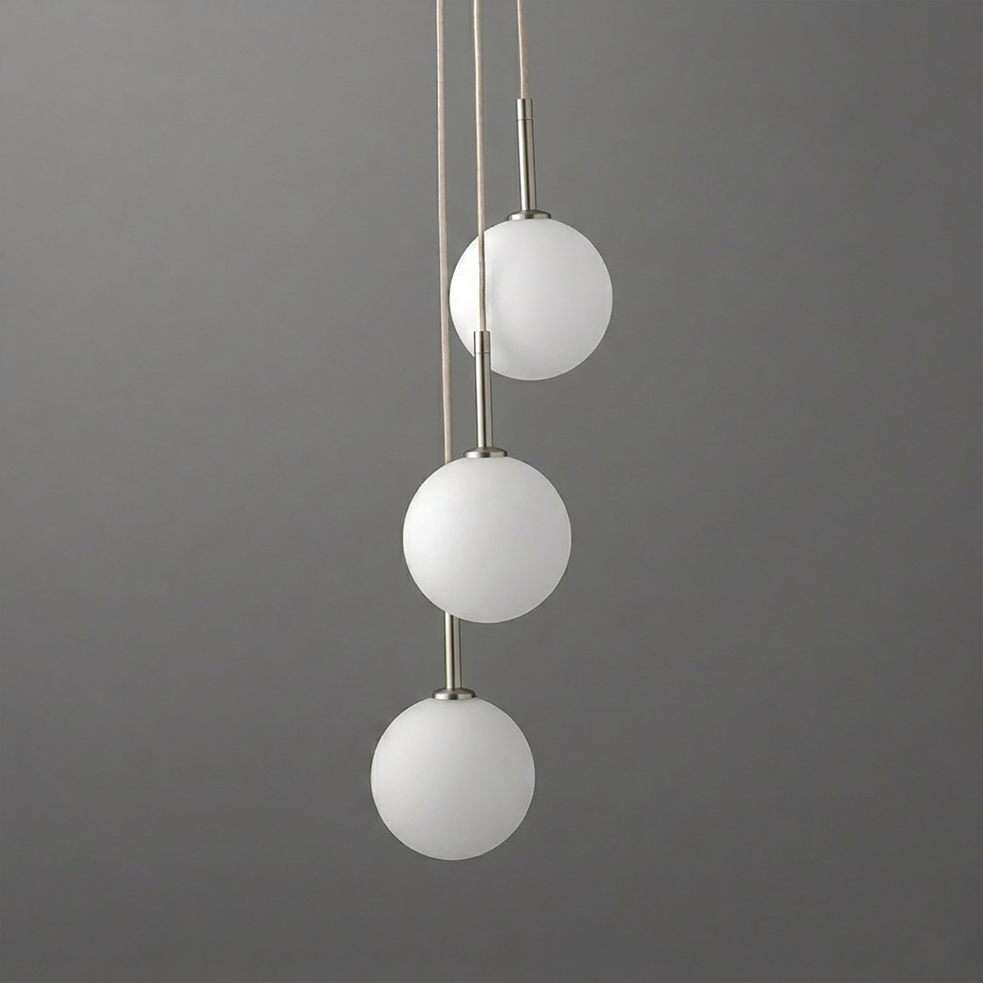 Modern chandelier with three white frosted glass globes suspended on slender metallic rods in a vertical arrangement. - CHANDELIER MODEL NO. 4701