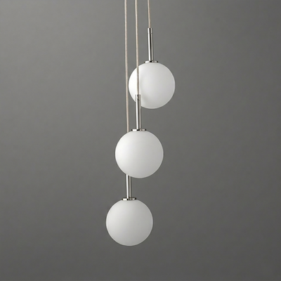Three-globe pendant chandelier with frosted white glass and brushed metal fixtures on adjustable cords. - CHANDELIER MODEL NO. 4701