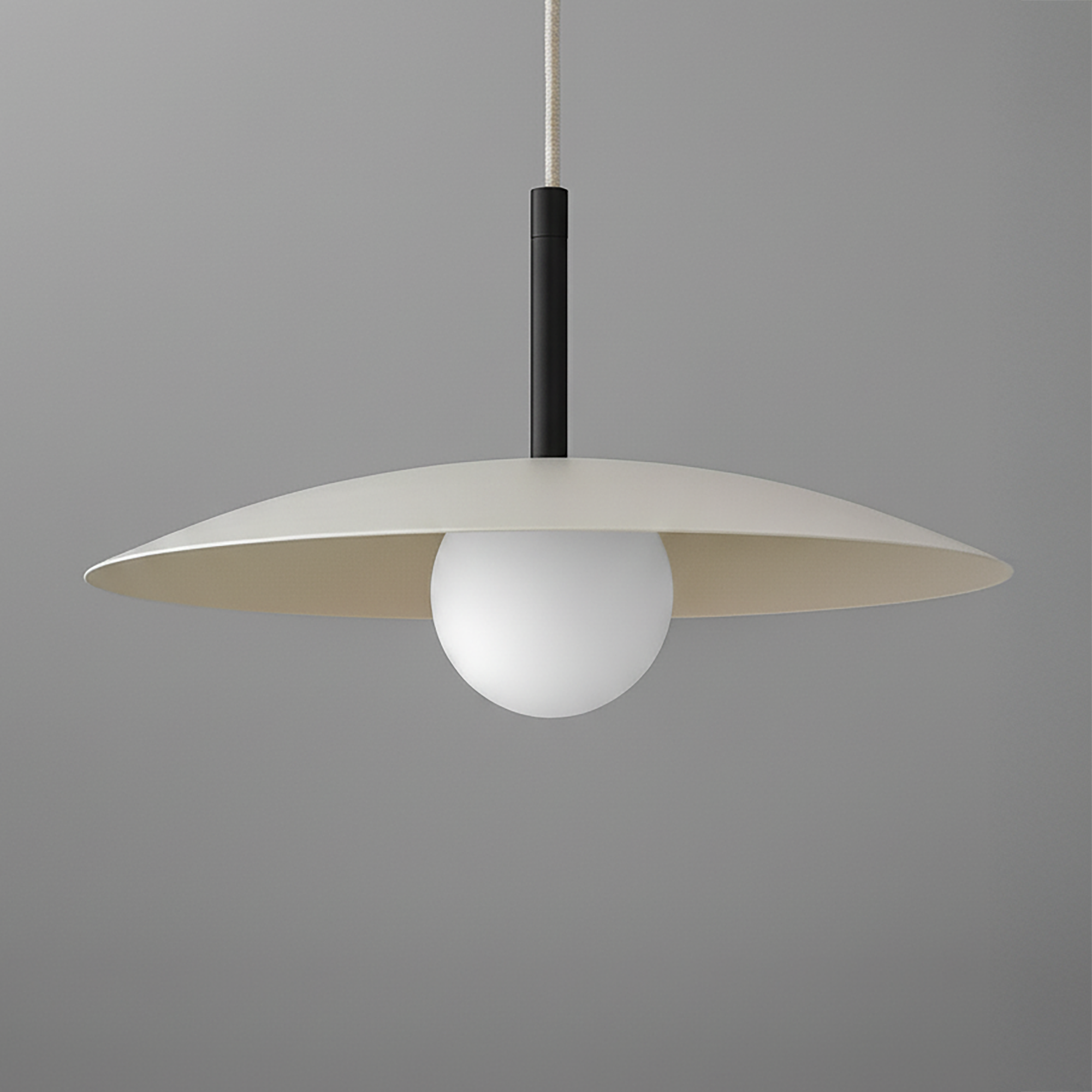 Minimalist white disc pendant light with a black stem and white cord against a gray background. - PENDANT MODEL NO. 5693