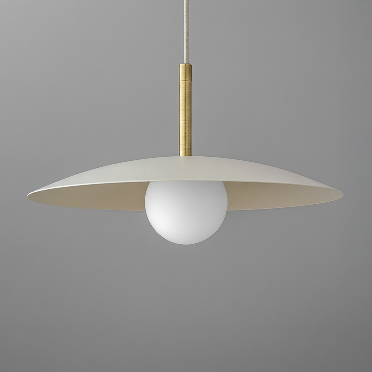 Pendant light with wide matte cream metal shade, round white globe bulb, and brass rod suspension. - PENDANT MODEL NO. 5693