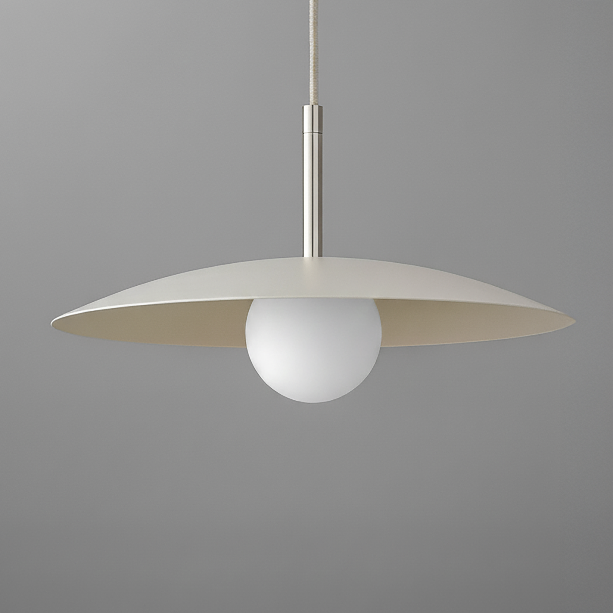 Modern pendant light with a wide, flat beige metal shade and a white globe bulb suspended from a slender metallic fixture. - PENDANT MODEL NO. 5693