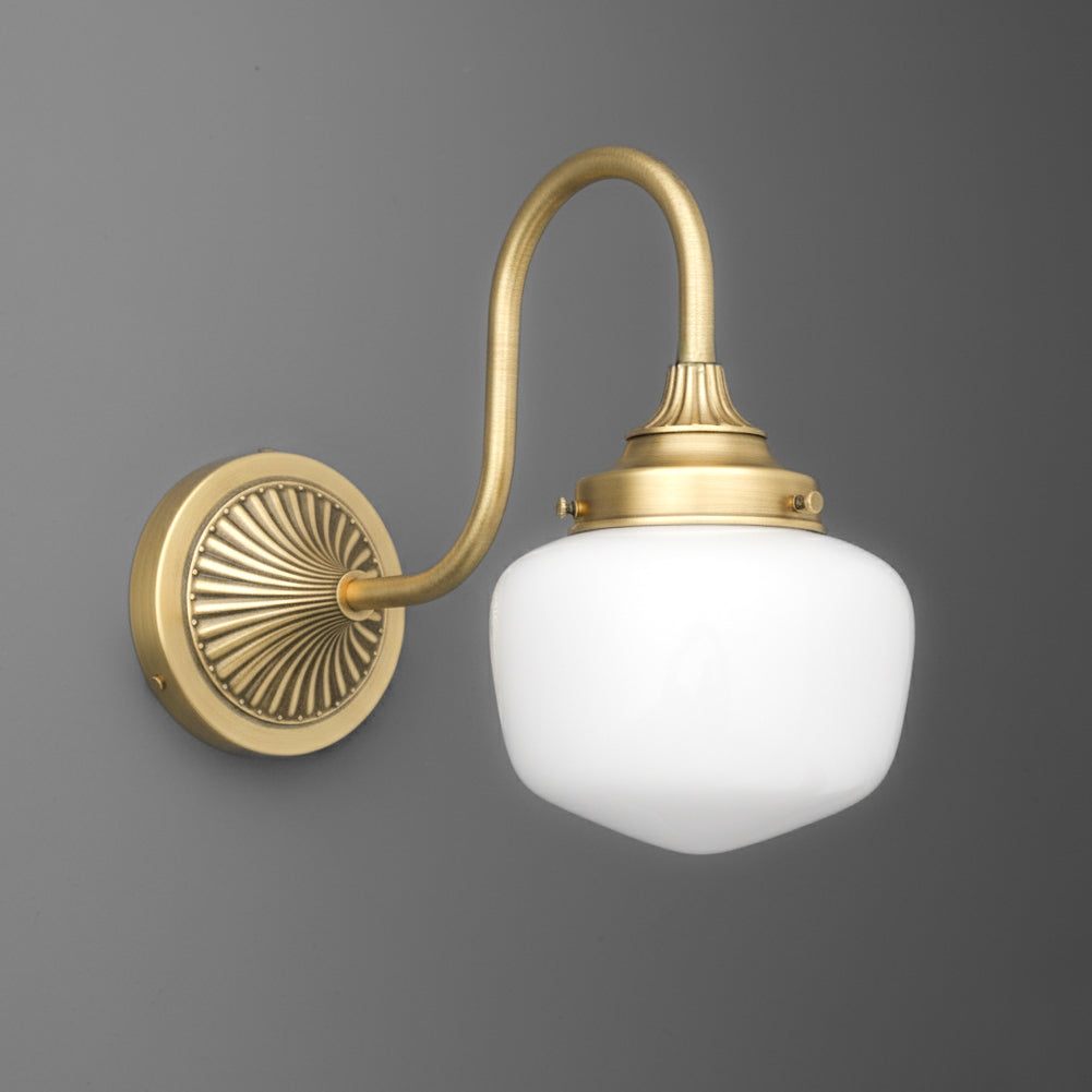Brushed brass wall sconce with curved arm and frosted white glass globe shade. - SCONCE MODEL NO. 1061