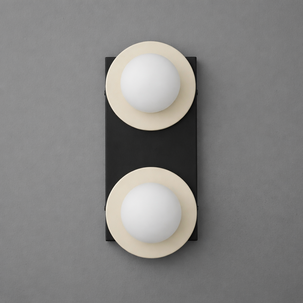 Two-light sconce with Cream round plates and opal glass globes on a tall rectangular Black backplate. - SCONCE MODEL NO. 8828