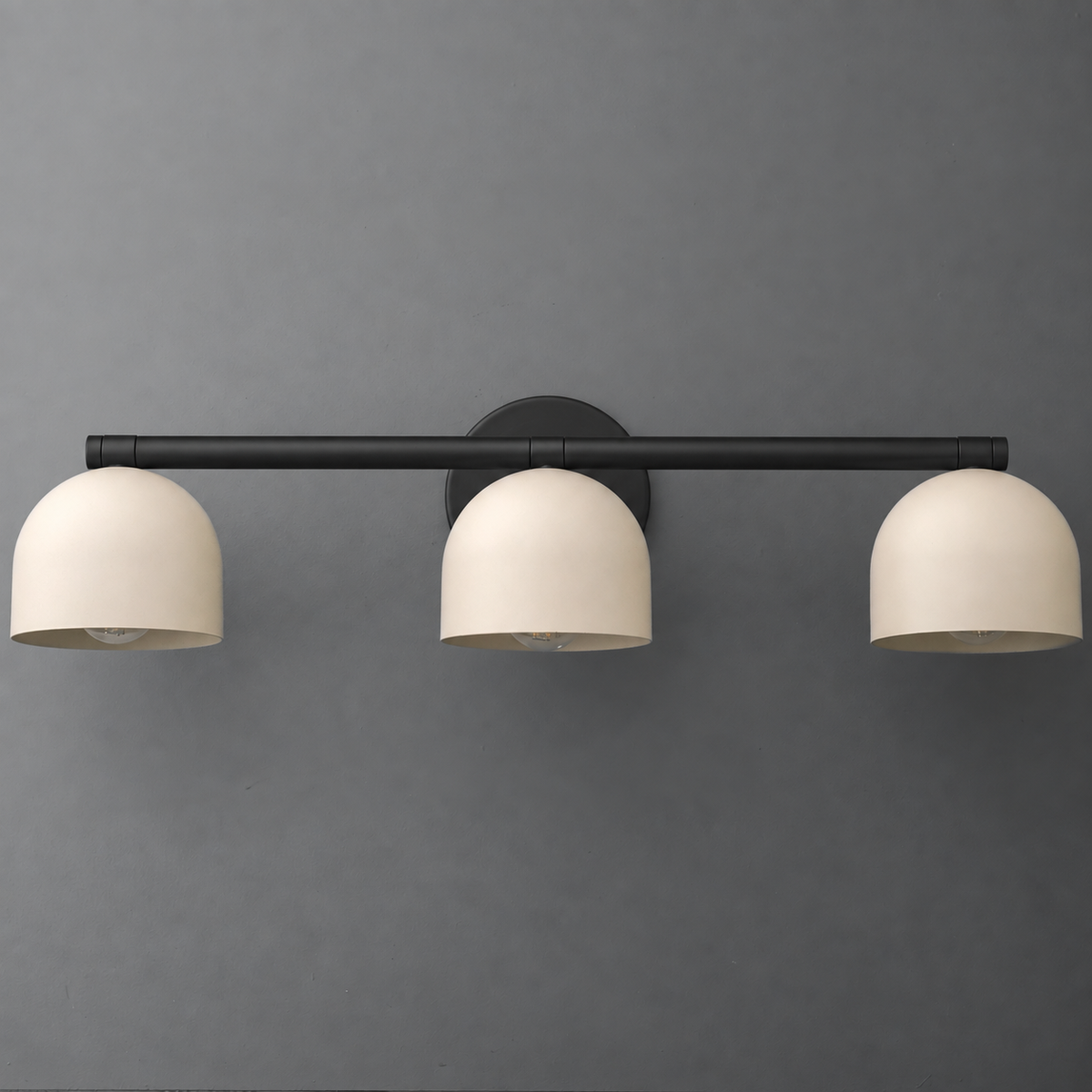 Three-light vanity light in Black with Cream dome shades hanging from a long straight bar on a round wall plate. - VANITY LIGHT MODEL NO. 1169